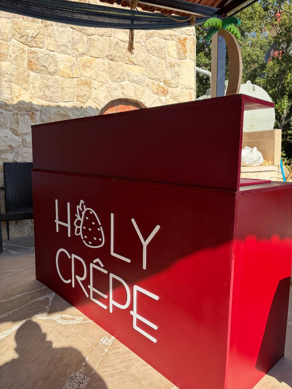 The burgundy Holy Crepe cart ready to serve outdoors